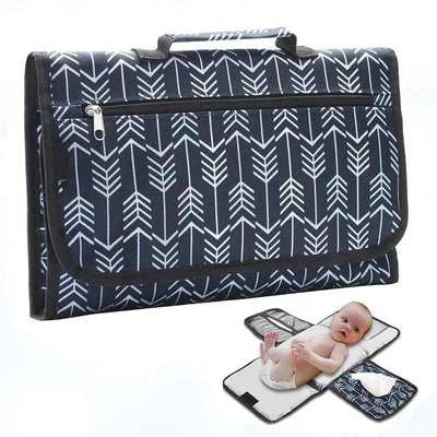 Deluxe 3-in-1 portable baby changing pad with foldable design and arrow pattern exterior